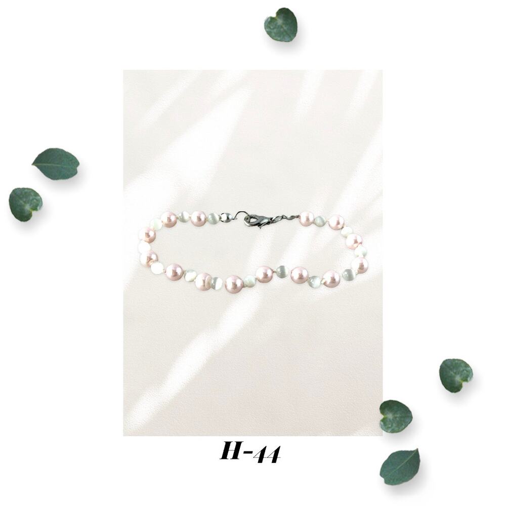 Pink Glass Pearl & White Cat's Eye Knotted Bracelet